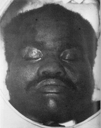 Deceased Garvey in coffin, 1940